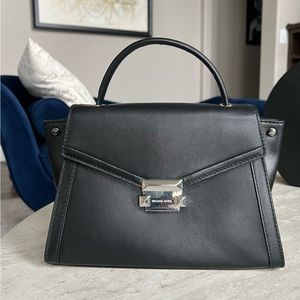 Michael Kors Small Black handbag… like new. No signs of wear!
